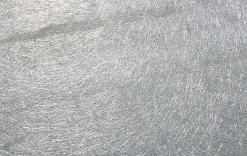 Over Langshaw laminate fibreglass or shingles?